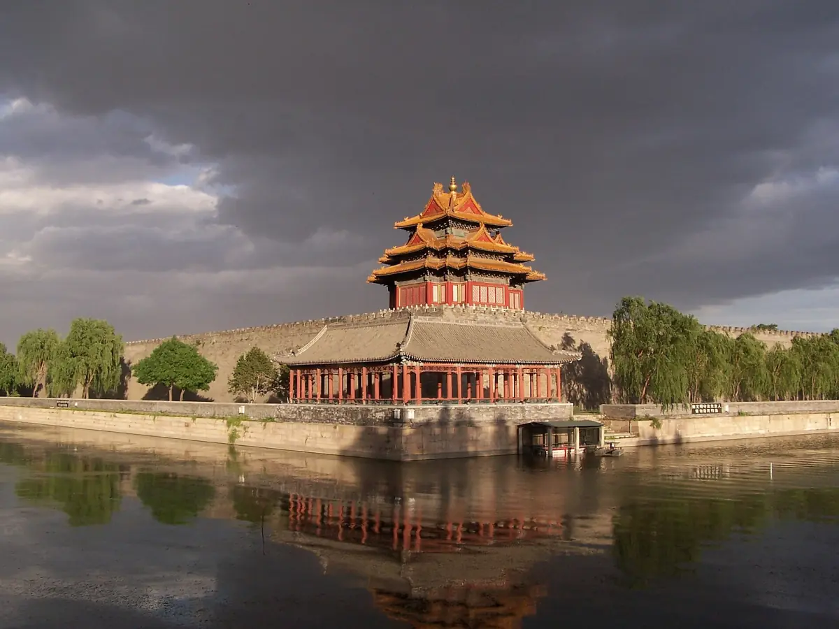A corner tower of the Forbidden City at sunset